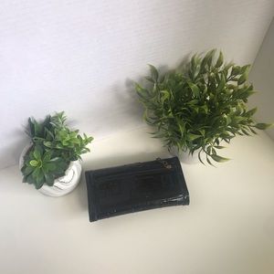 Guess wallet in used condition. Still has lots of life in it